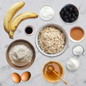 Fresh ingredients for banana blackberry oatmeal muffins.